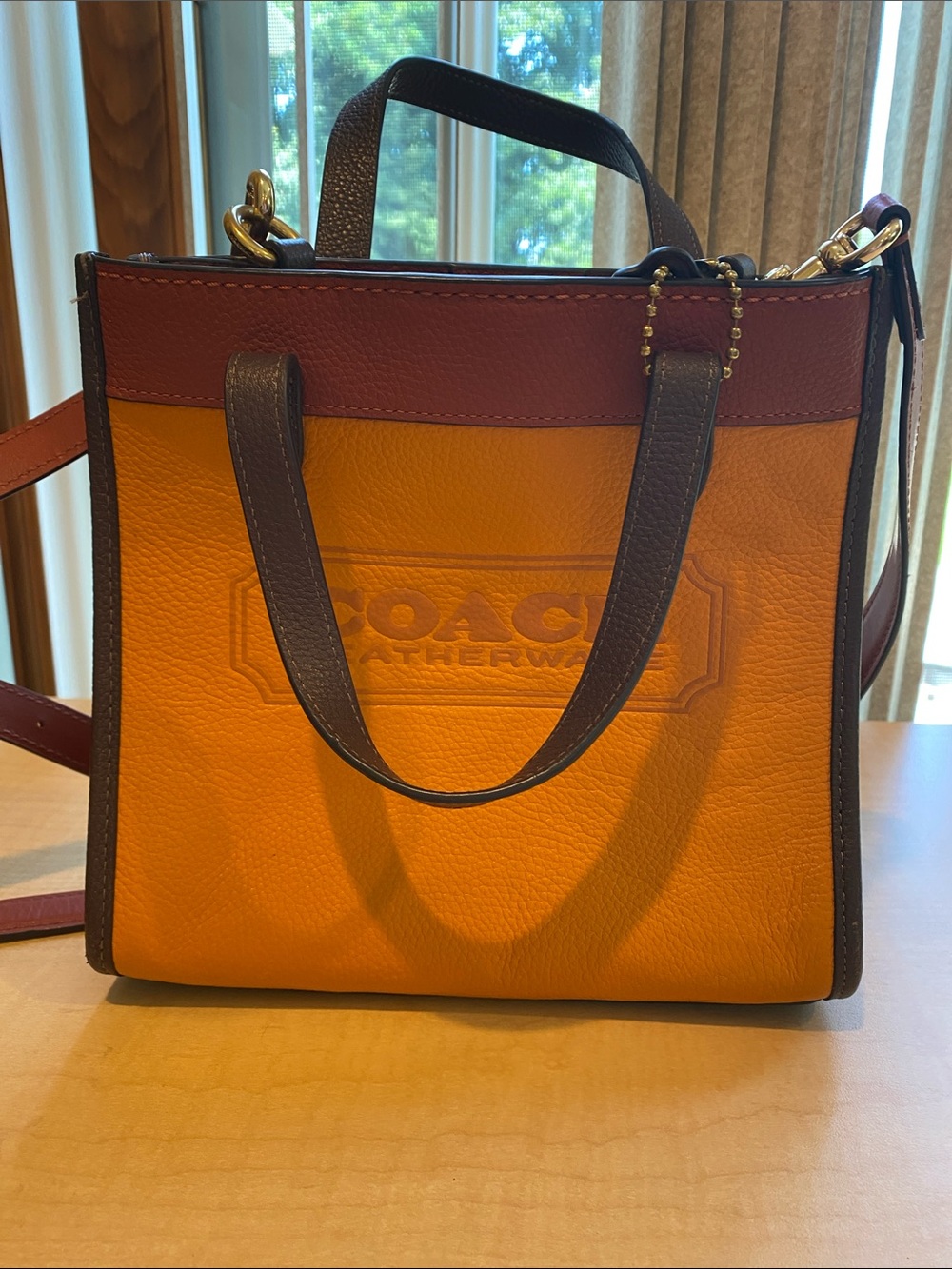 Coach Two-Tone Pebble Leather Tote in Orange and Burgundy
